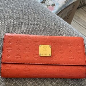 MCM Orange Embossed Leather Wallet